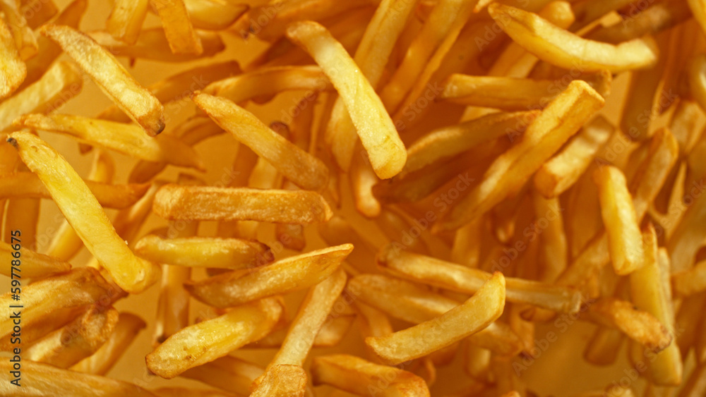 French fries - fried potatoes flying. French fries - fried potatoes flying.