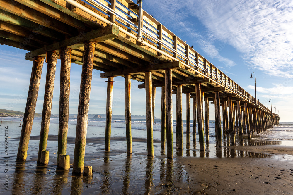 A view on the pier on the Pacific coast at sunset A view on the pier on the Pacific coast at sunset