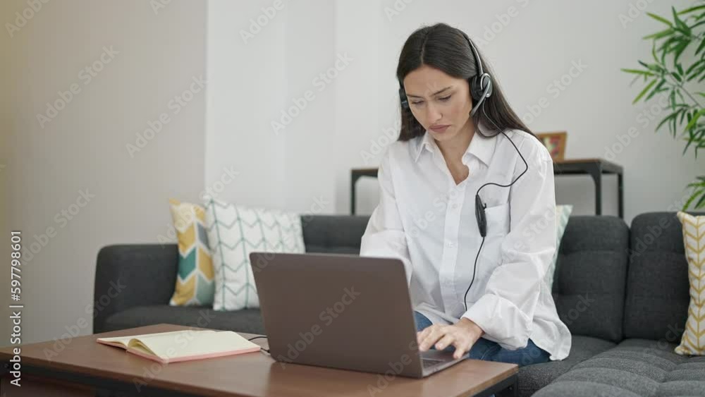 Young beautiful hispanic woman call center agent working at home Young beautiful hispanic woman call center agent working at home