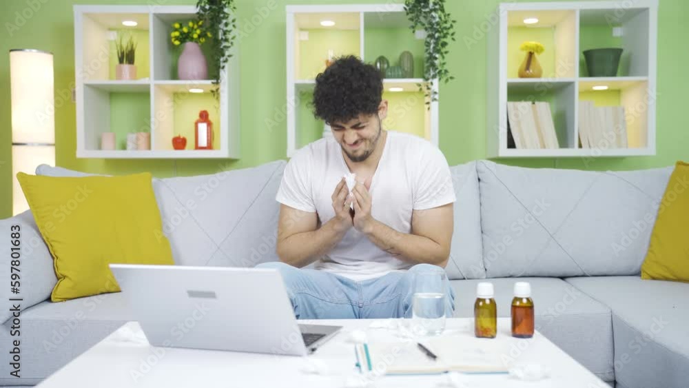Sick man at home sneezing and taking medicine. Sick man at home sneezing and taking medicine.