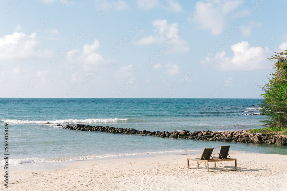 Wooden beach chair on white sand beach at Koh Kood, Thailand. Wooden beach chair on white sand beach at Koh Kood, Thailand.