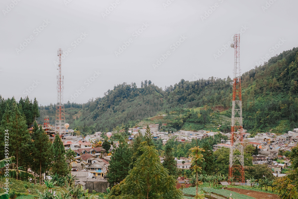 Obraz premium Two A cell tower in the mountains in clear weather