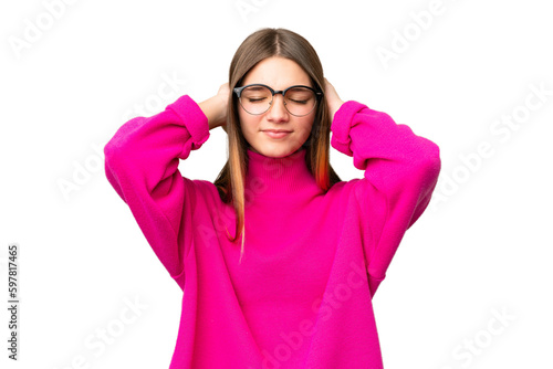 Teenager girl over isolated chroma key background frustrated and covering ears © luismolinero