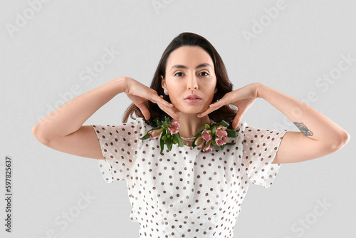 Young woman in dress with a...
