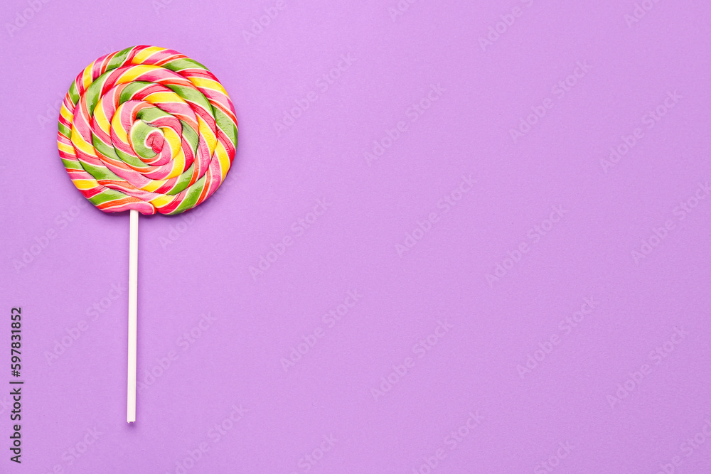 Colorful lollipop on purple background Colorful lollipop on purple background