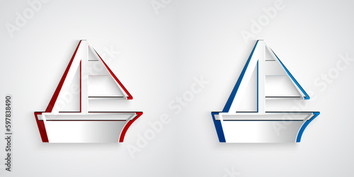 Paper cut Yacht sailboat or sailing ship icon isolated on grey background. Sail boat marine cruise travel. Paper art style. Vector
