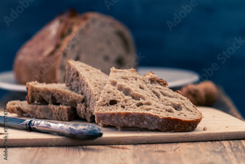 Homemade freshly baked rustic rye or whole wheat sourdough bread with copy space