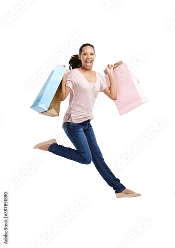Portrait, jump or happy woman with shopping bags or fashion isolated on transparent png background. Jumping celebration, sales deals or excited girl customer with designer clothes or luxury products
