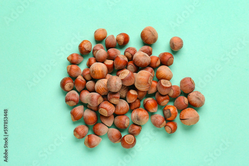 Pile of whole hazelnuts on ...