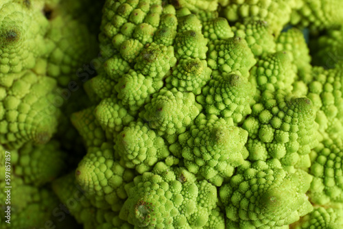 Fresh Romanesco broccoli as background, closeup