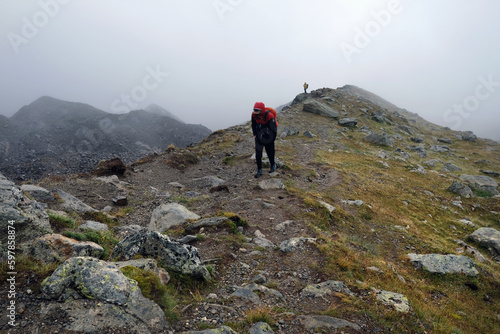 Hiking at Refuge Nid d'Aigle, Bionnassay glacier, on the finish of the Tramway du Mont Blanc tour, French alps, Rhone - Alpes, Chamonix area, France