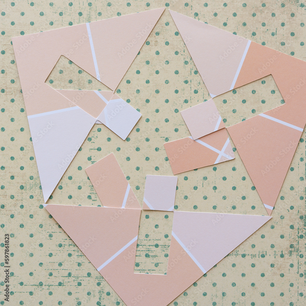Fototapeta premium geometric paper cutouts on scrapbook paper with dots