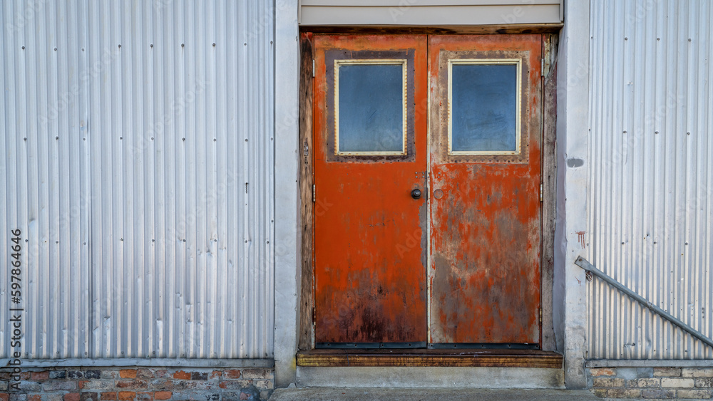 grunge backdoor to a building in an alley grunge backdoor to a building in an alley