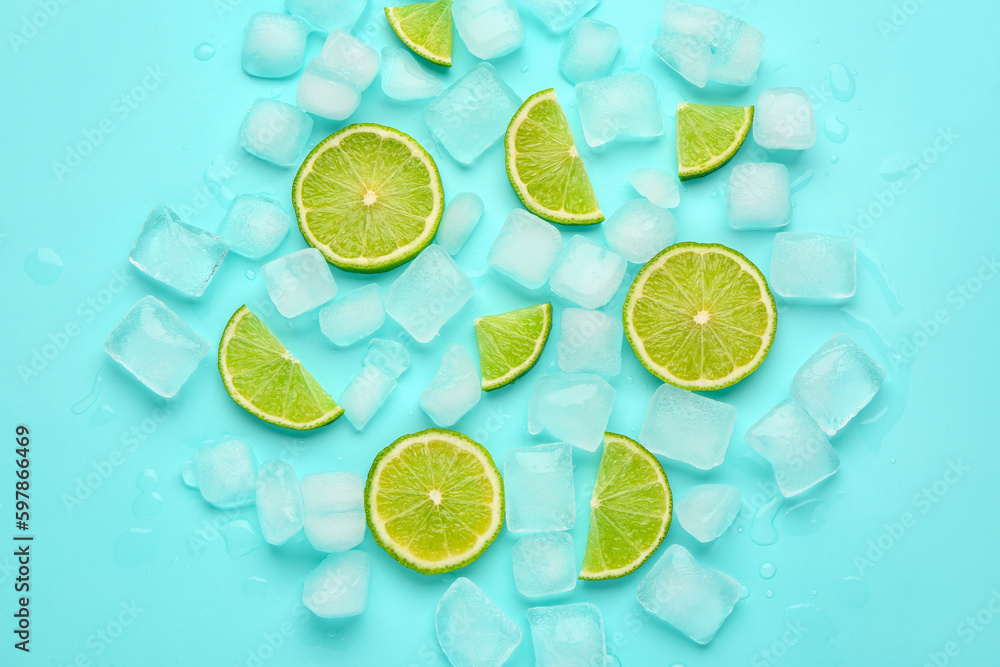 Sliced fresh lime and ice cubes on turquoise background Sliced fresh lime and ice cubes on turquoise background