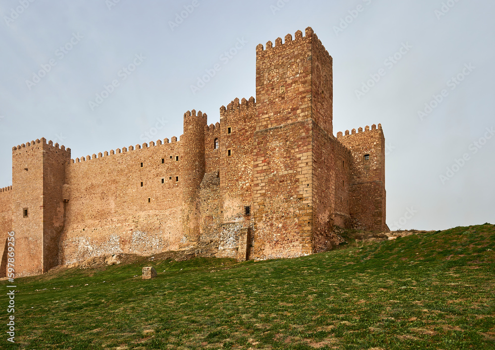 exterior view of the Castle of Sigüenza with its round Arab towers and the square Christian towers