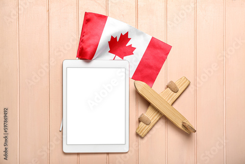 Canadian flag with tablet c...