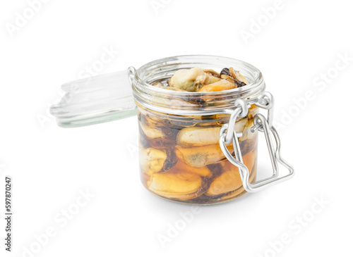 Marinated mussels in open jar on white background