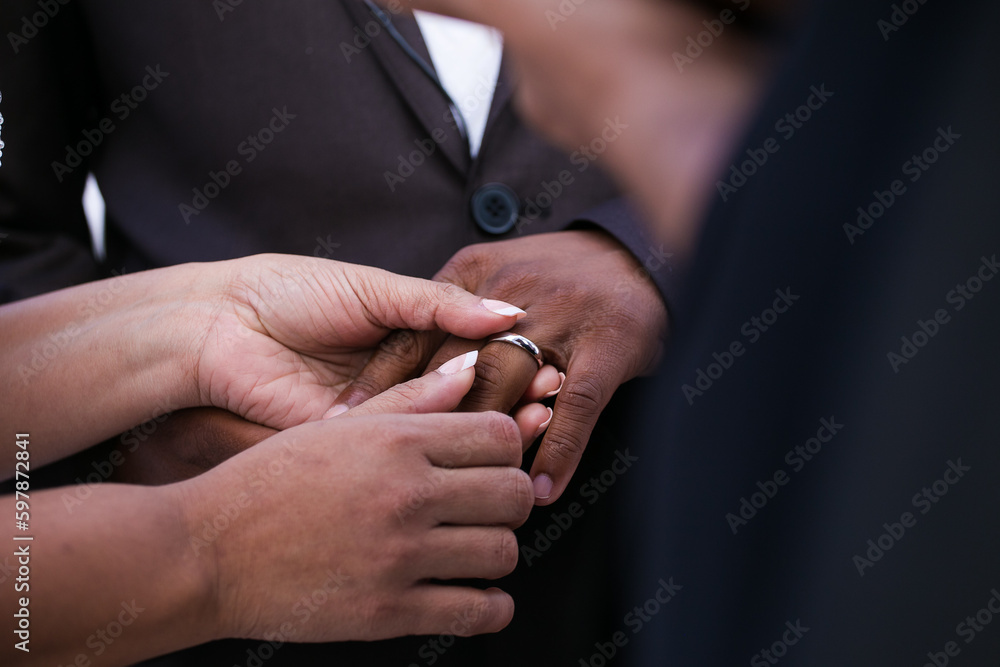 Intimate Moment of a couple Exchanging Wedding Rings at a wedding