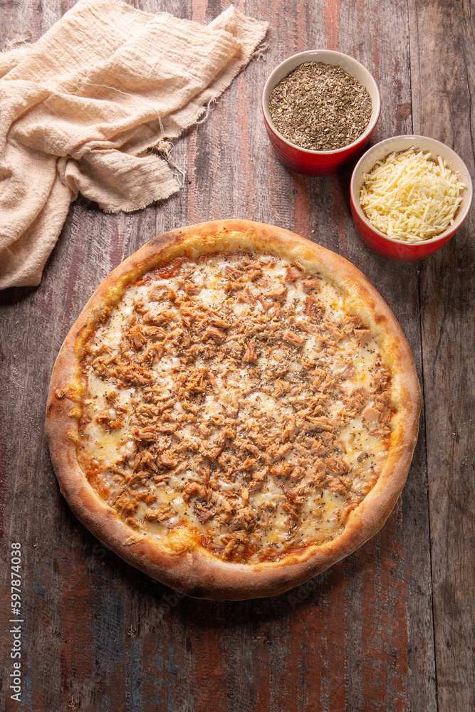Tuna pizza with mozzarella and tomato sauce, Brazilian pizza. Tuna pizza with mozzarella and tomato sauce, Brazilian pizza.
