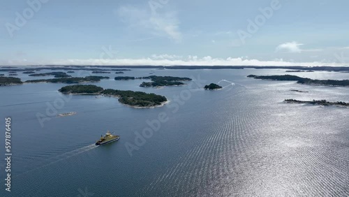 Vehicle ferry and boats in archipelago sea in Finland photo