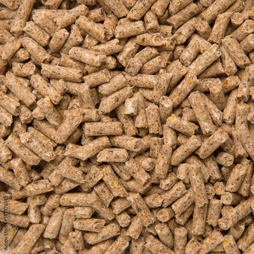 Close-Up Looped Rotation of Compacted Wooden Sawdust Pellets - Natural Cat Litter Filler or Organic Fuel