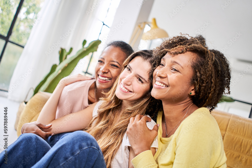 Fototapeta premium Three beautiful happy young woman taking smiling selfie looking. at the camera at home. Cheerful female people family and friends together. High quality photo