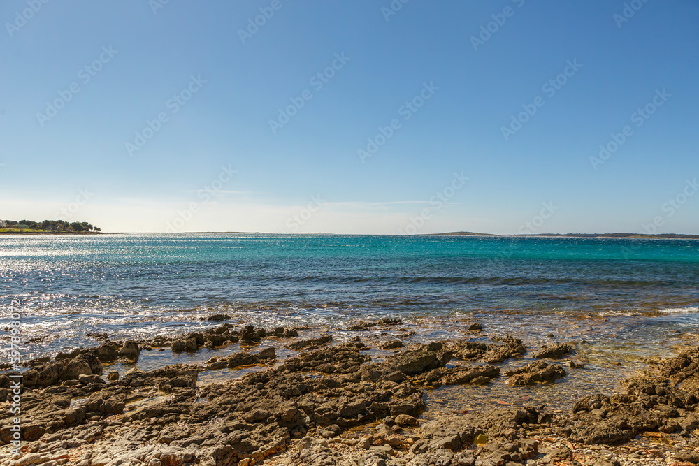 Beach view from Medulin, Istria, Croatia, in early spring during a sunny day Beach view from Medulin, Istria, Croatia, in early spring during a sunny day