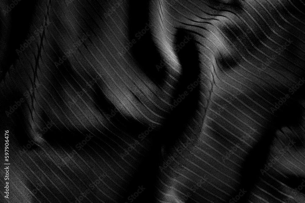 Naklejka premium Dark black and gray blurred gradient and line of cloth or fablic background has a little abstract light.