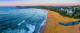 Aerial sunrise panorama  at the seaside with a hazy clear sky