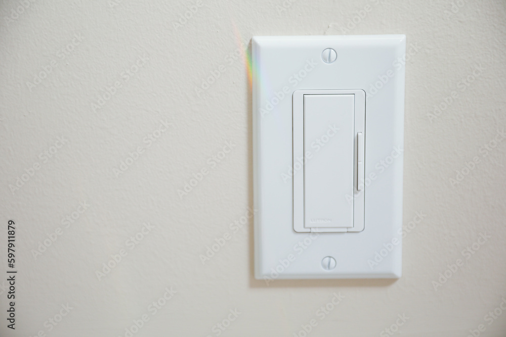 The light switch, turned on or off, is a simple but powerful symbol of control over light and darkness, illumination and obscurity, clarity and mystery The light switch, turned on or off, is a simple but powerful symbol of control over light and darkness, illumination and obscurity, clarity and mystery