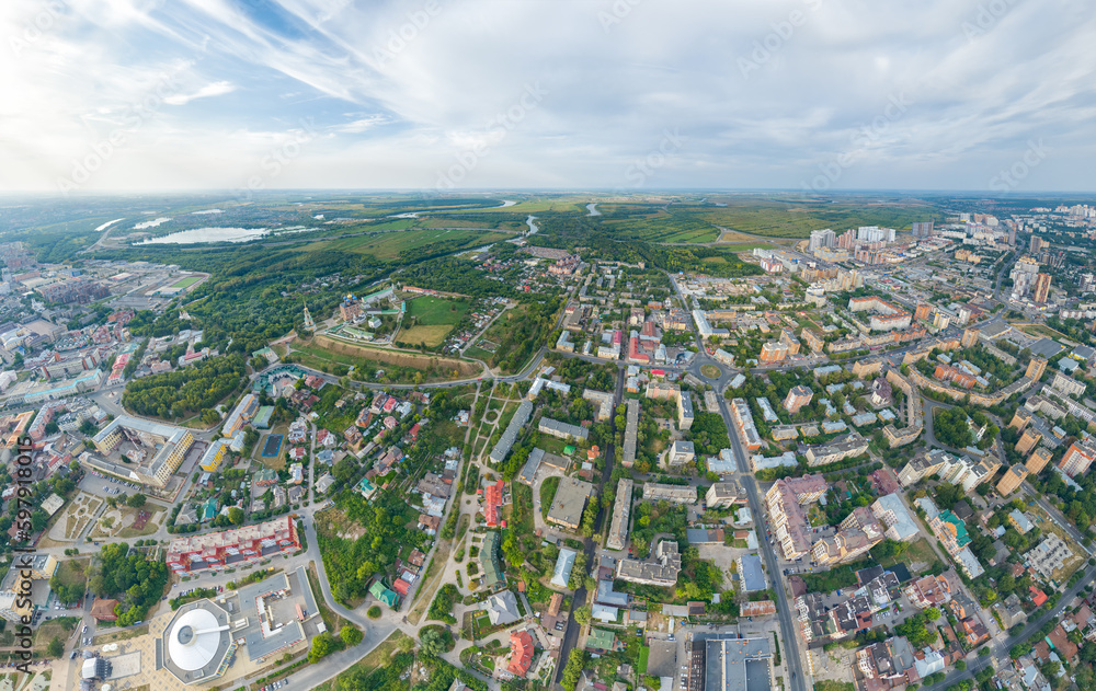 Ryazan, Russia. Ryazan Kremlin - The oldest part of the city of Ryazan. Protected meadow. Panoramic view of the city from the air. River Oka. River Turbezh. Aerial view