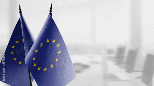 Small national flag of the European Union on a black background