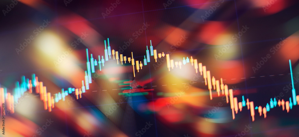 Concept of stock market and fintech. Blurry digital charts over dark ...