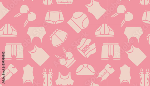 A pink background with different types of underwer.