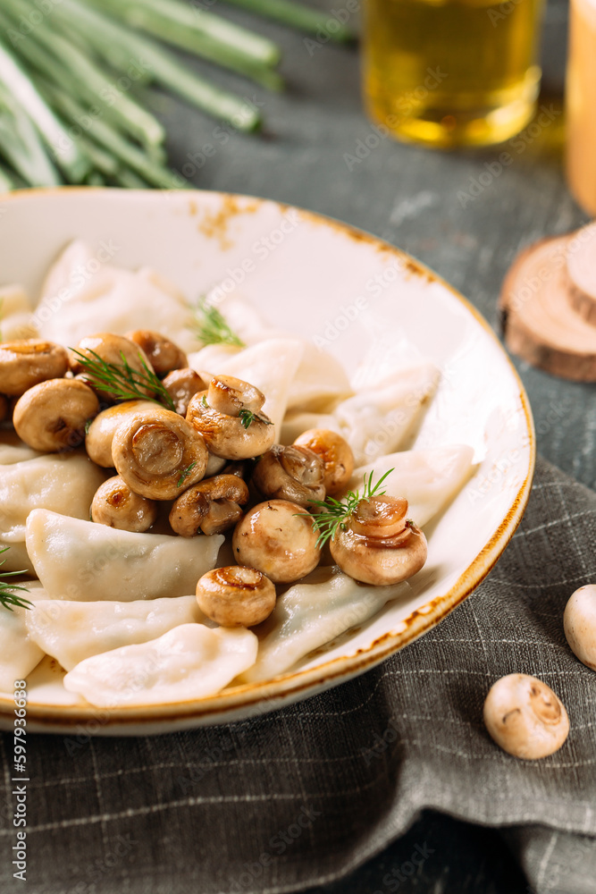 Portion of russian dumplings vareniki with mushroom filling Portion of russian dumplings vareniki with mushroom filling