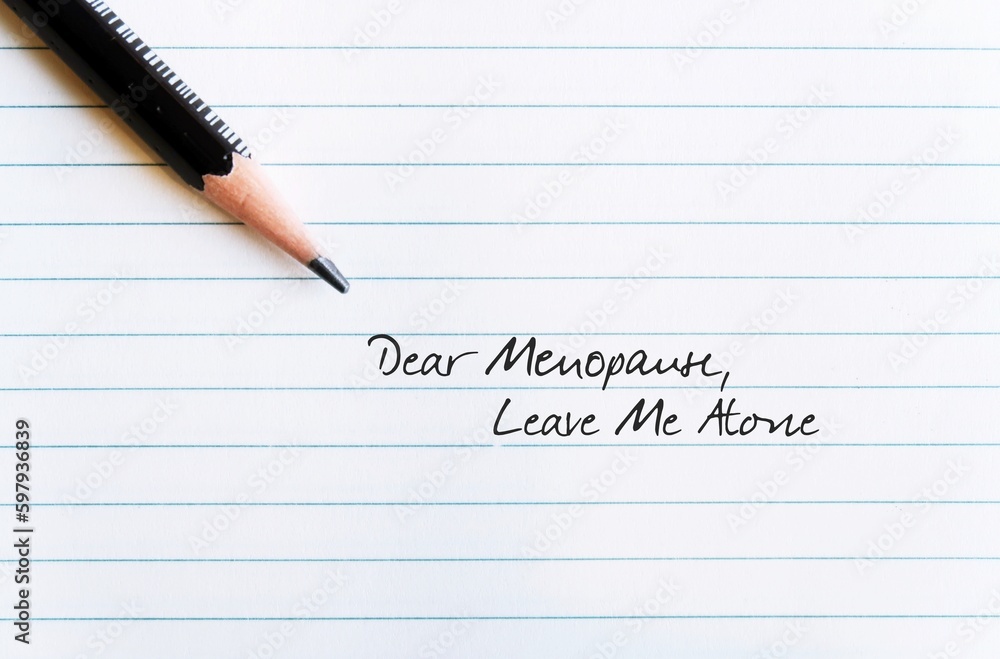Note paper with pencil writing Dear Menopause LEAVE ME ALONE, concept of middle aged women dealing or coping with age and menopause symptoms Note paper with pencil writing Dear Menopause LEAVE ME ALONE, concept of middle aged women dealing or coping with age and menopause symptoms