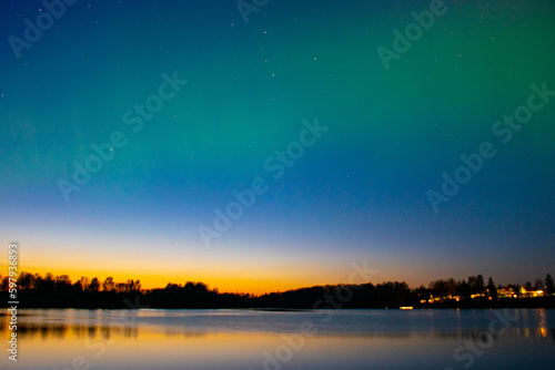 northern lights and its reflection the lake, northern lights shimmer over the lake, northern lights in spring, Lielais Ansis, Rubene, Latvia