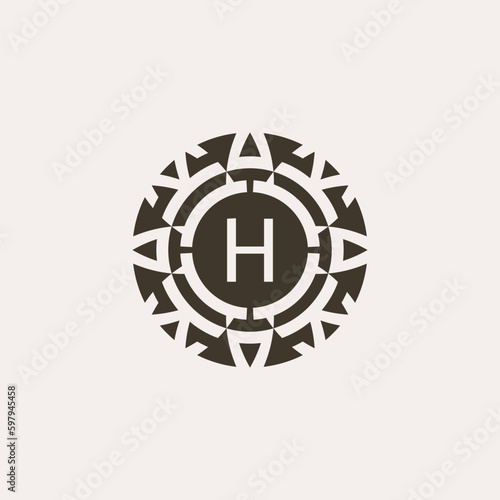 Initial letter H ornamental medal abstract relief logo