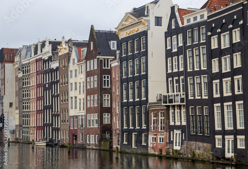 colored houses on the canals of Amsterdam © Joeslaa