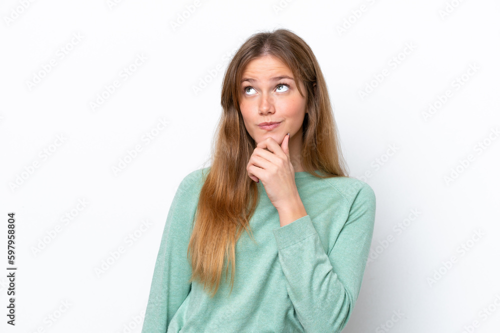 Young caucasian woman isolated on white background and looking up Young caucasian woman isolated on white background and looking up