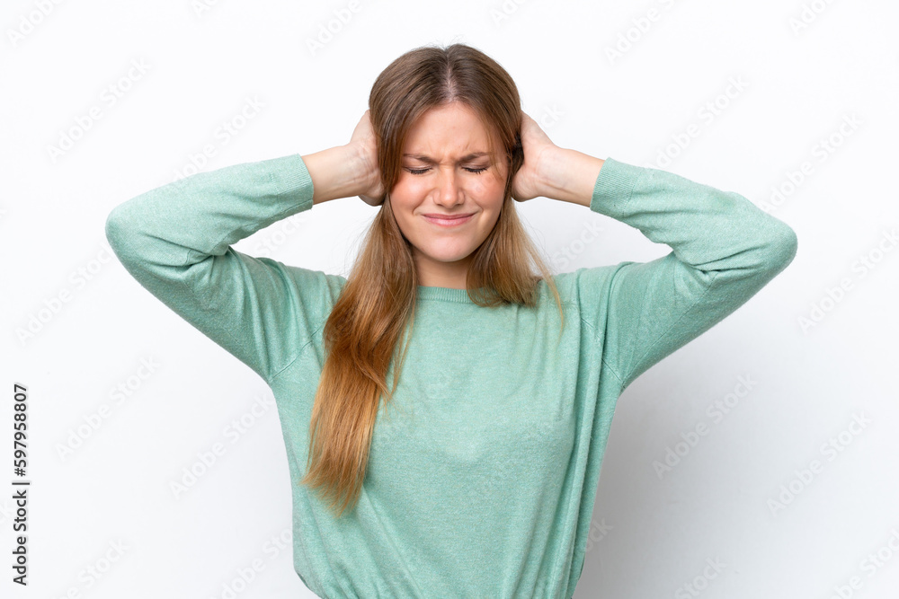 Young caucasian woman isolated on white background frustrated and covering ears Young caucasian woman isolated on white background frustrated and covering ears