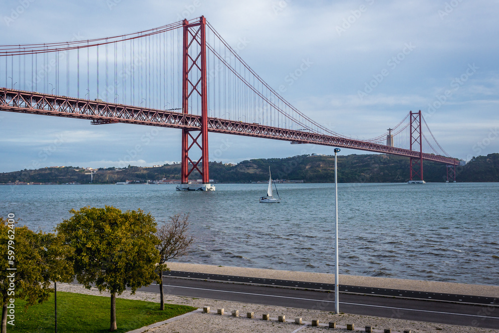 View on Bridge of 25th of April over River Tagus in Lisbon, Portugal