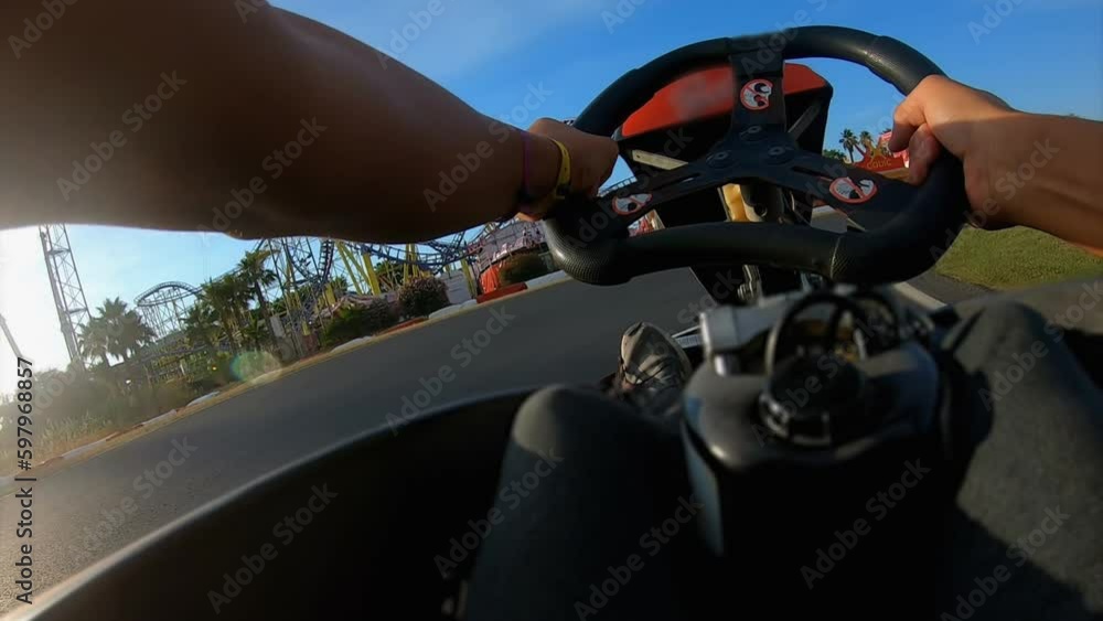 Man is driving a quick go-cart on the race track outdoors Generative AI