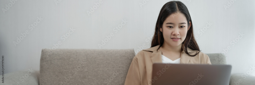 Start up Confident young asian business woman working in webcam group video call conference technology . Start up Confident young asian business woman working in webcam group video call conference technology .