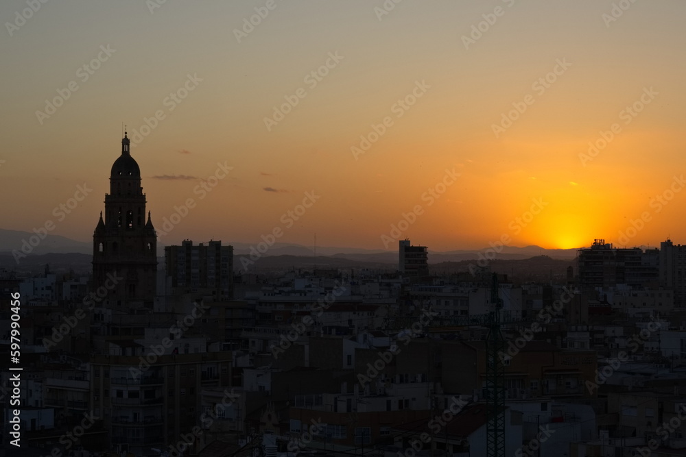 Sunset in Murcia with the cathedral tower in the background