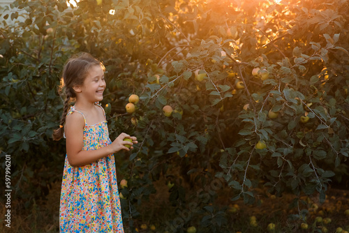 girl with apples, ripe apples, girl holding apples, apple orchard, Kids in meadow, eating apples
