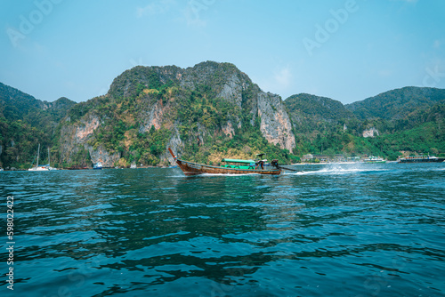 travel by longtail boat in Phi Phi islands