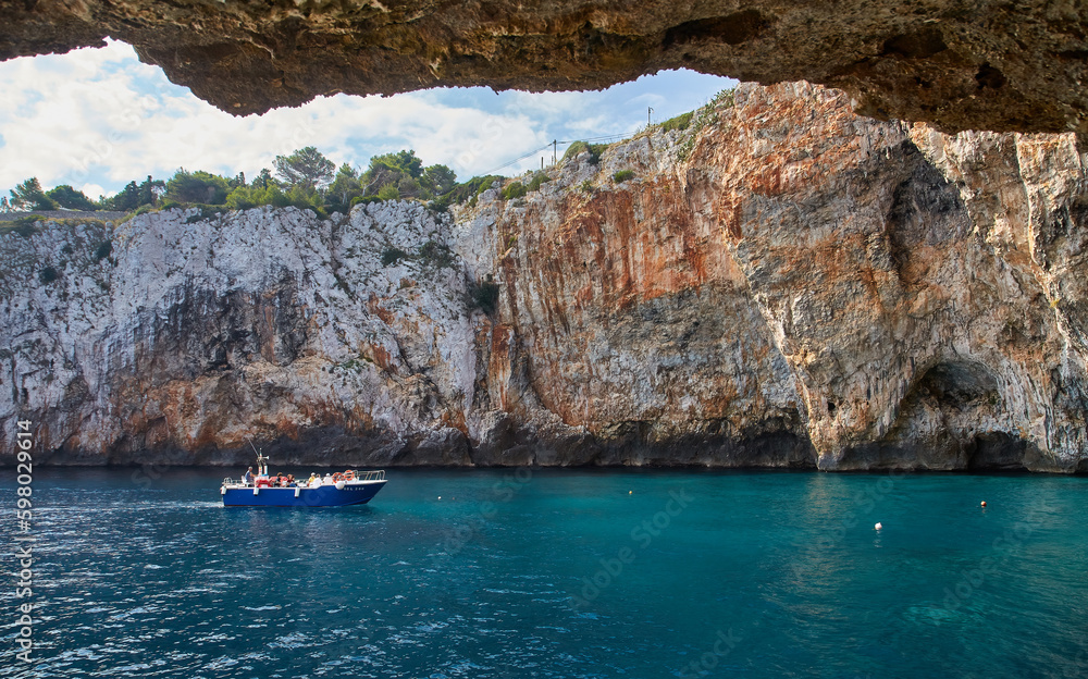 Grotta Zinzulusa, Italy - A motorboat at the famous grotto of Zinzulusa