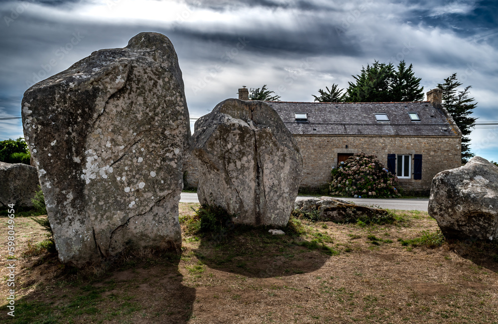 Ancient Stone Field Kerzerho Cruzuno With Neolithic Megaliths And Cottage Near Finistere Village Carnac In Brittany, France