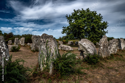 Ancient Stone Field Kerzerho Cruzuno With Neolithic Megaliths Near Finistere Village Carnac In Brittany, France
